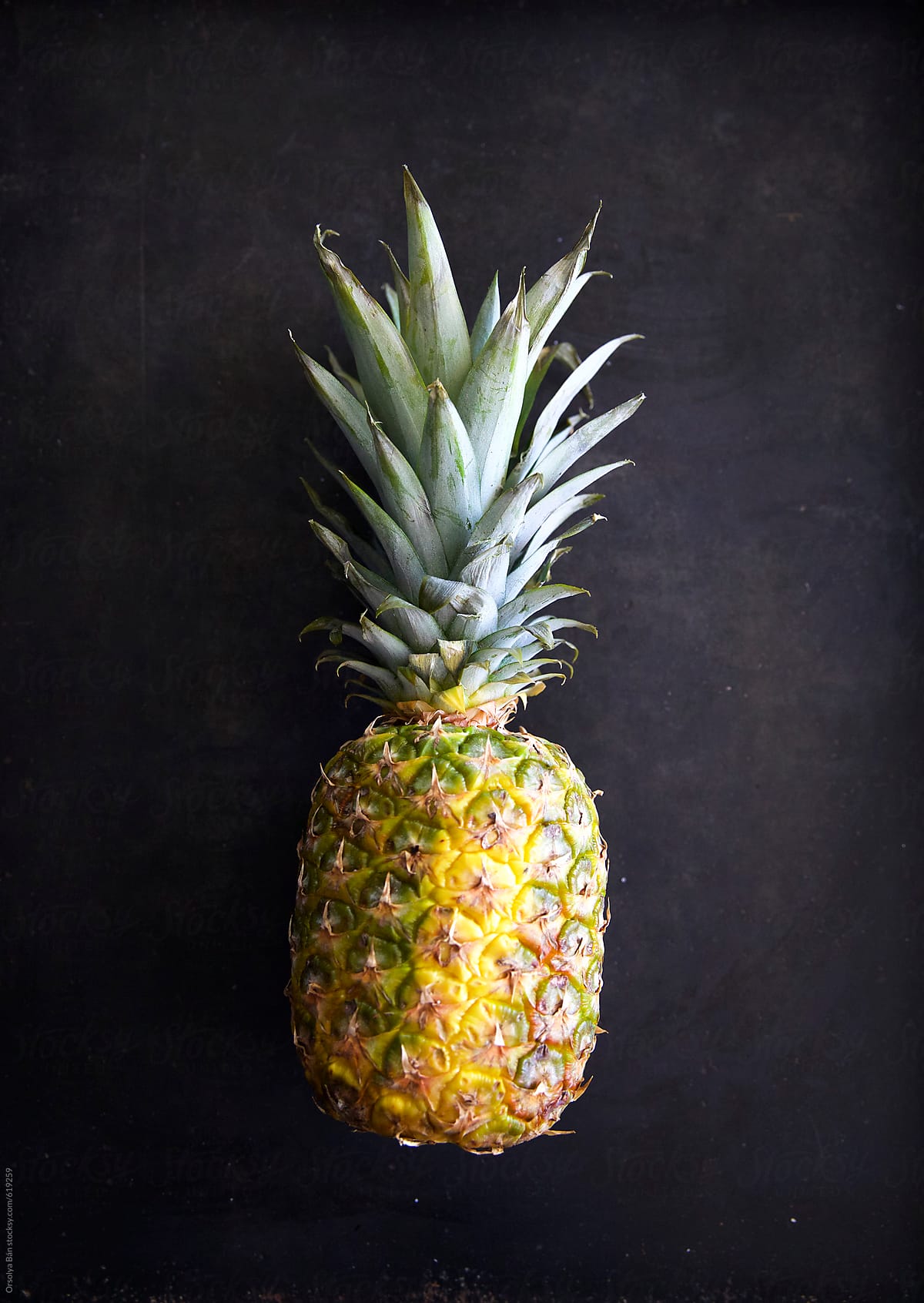 Pineapple on simple black background