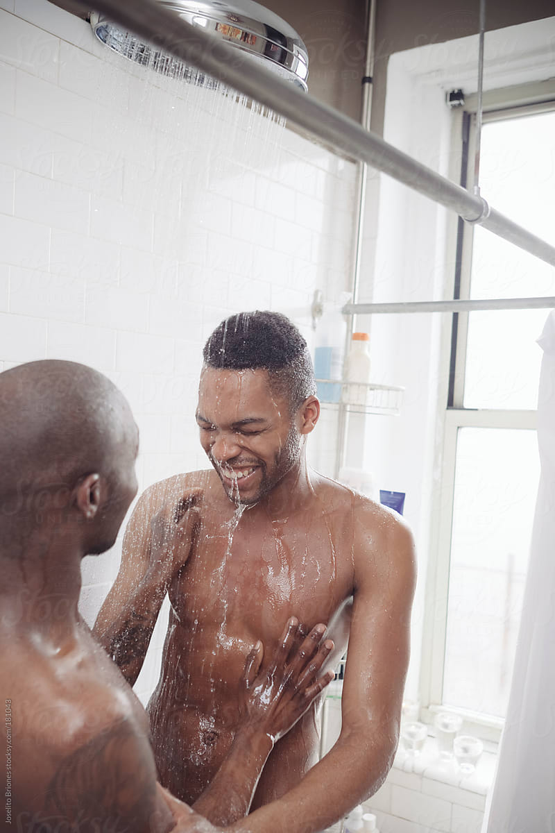 Gay Black Men Couple Having Fun Taking Shower Together by Stocksy  Contributor Joselito Briones - Stocksy