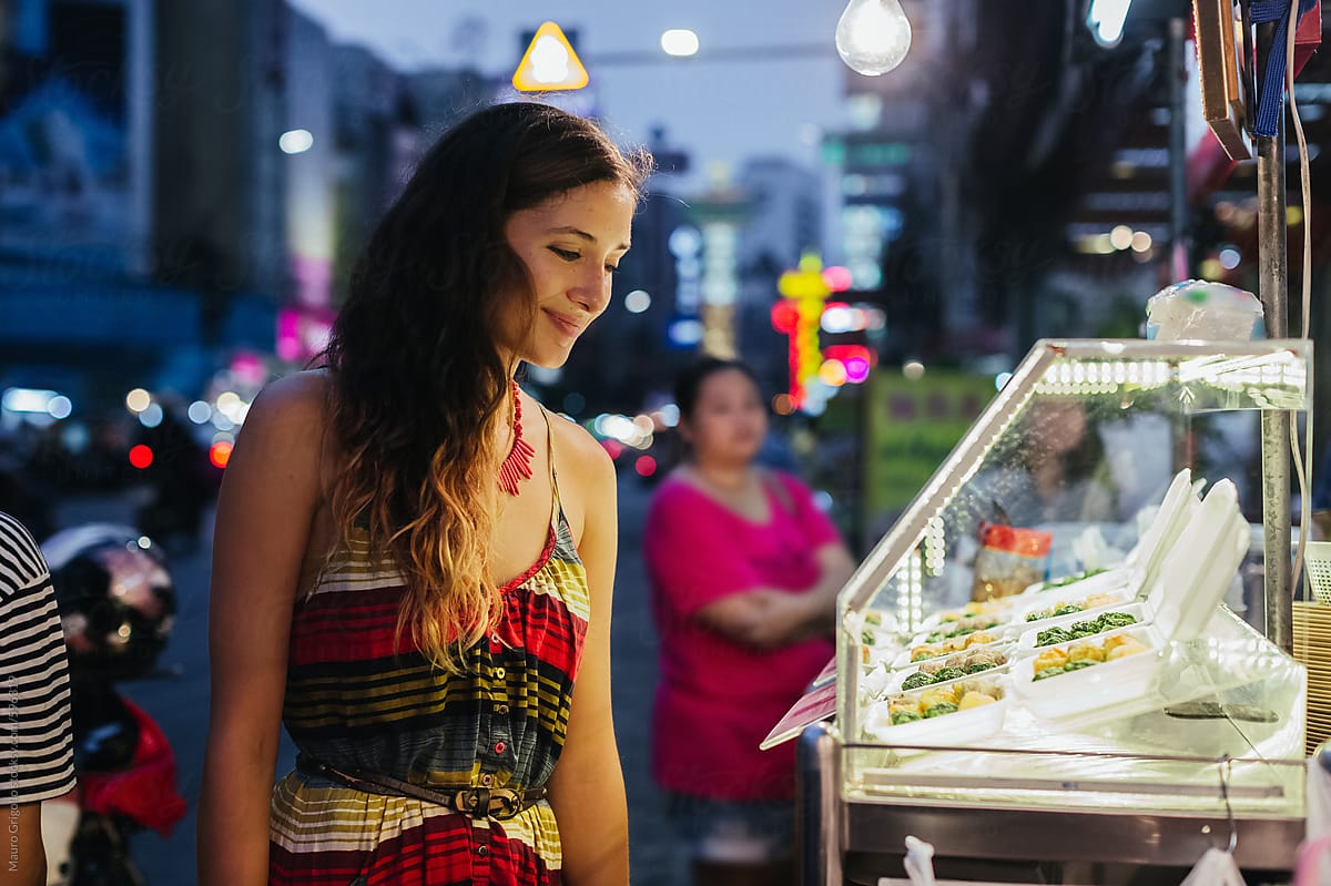 Woman in a street food night market