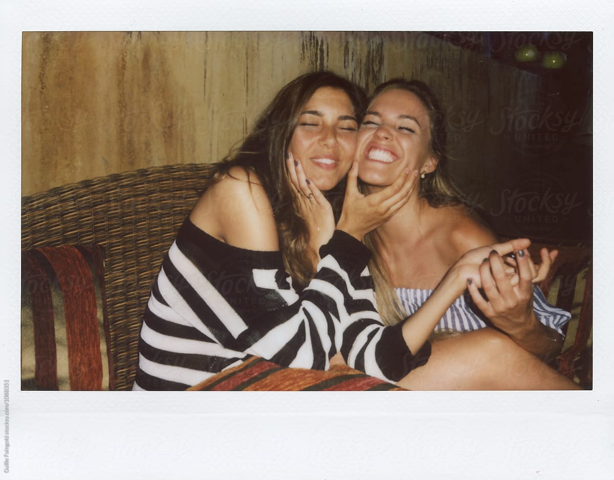 Happy Young Girlfriends Hugging By Stocksy Contributor Guille 
