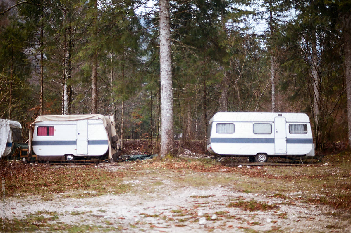 A lonely caravans in a forest