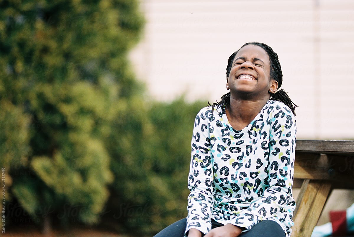 Black Girl Having A Laugh By Stocksy Contributor Gabi Bucataru Stocksy