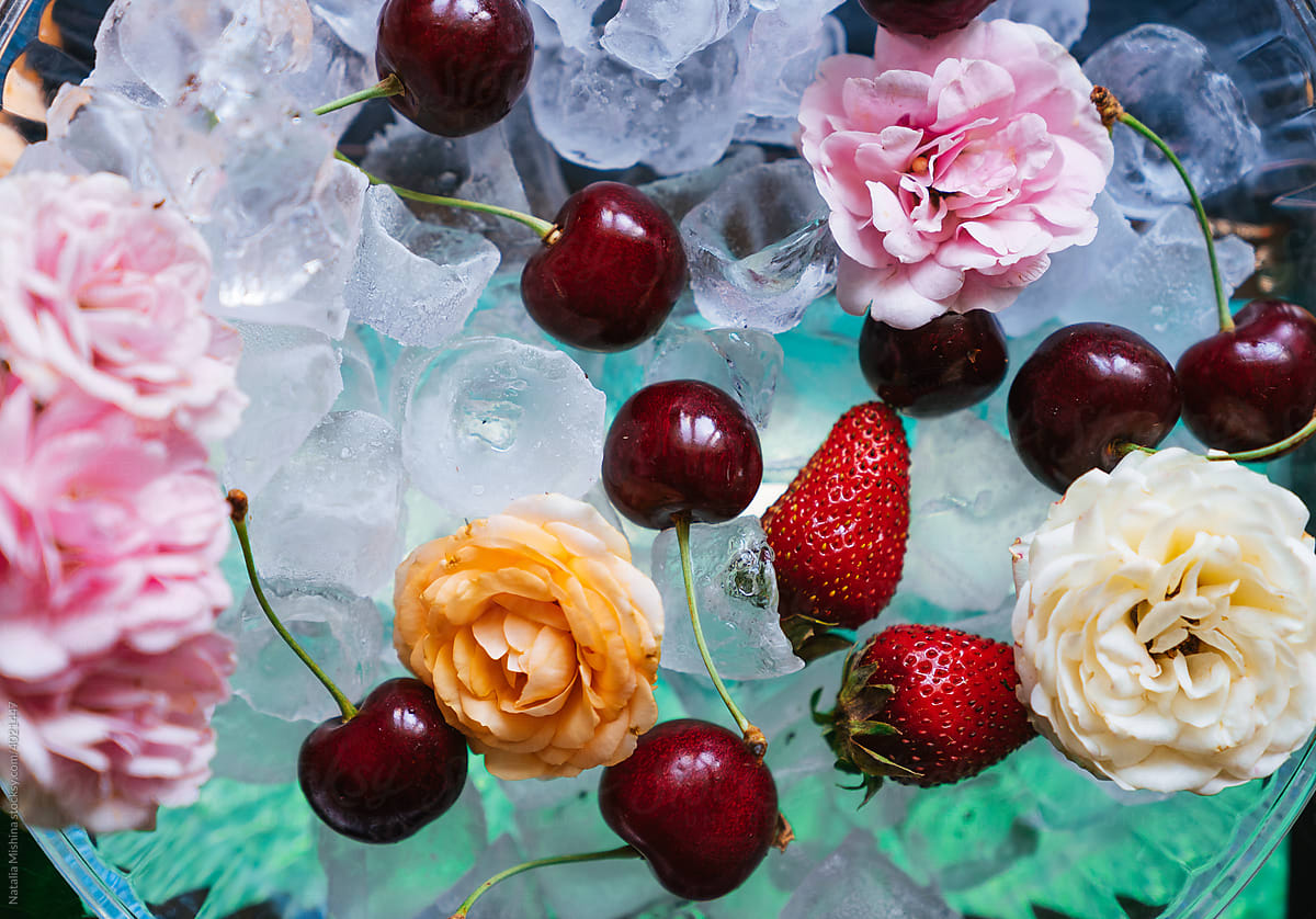 Berries and roses on ice.