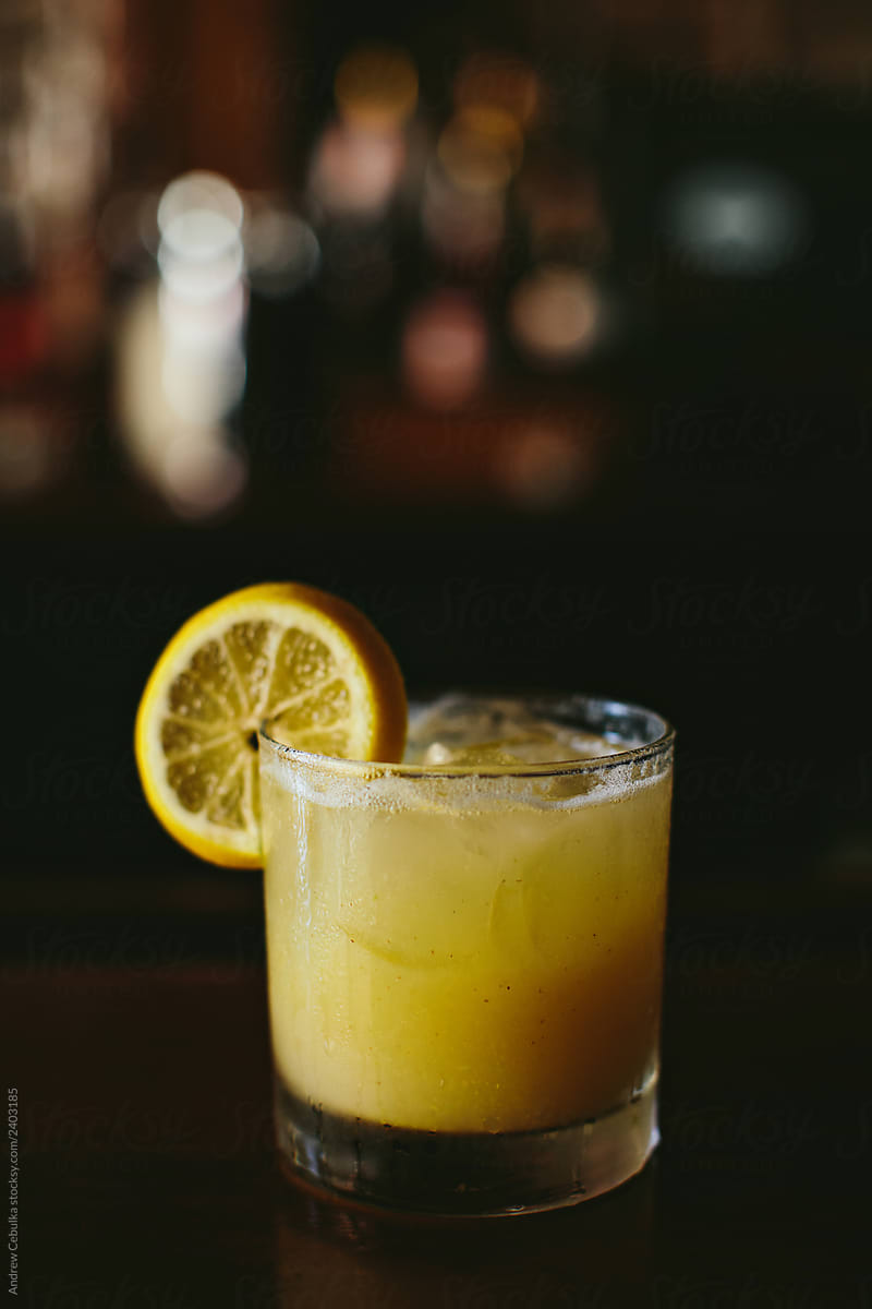 Citrus Cocktail in a Dark Bar