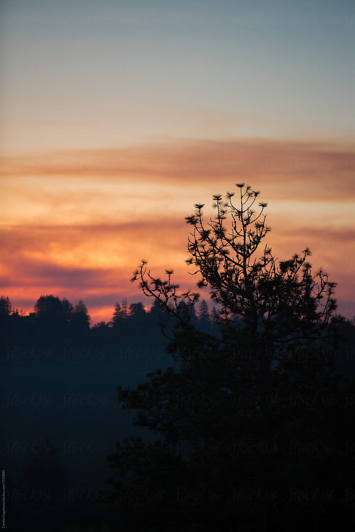 Vibrant sunrise with smoke from a nearby wildfire