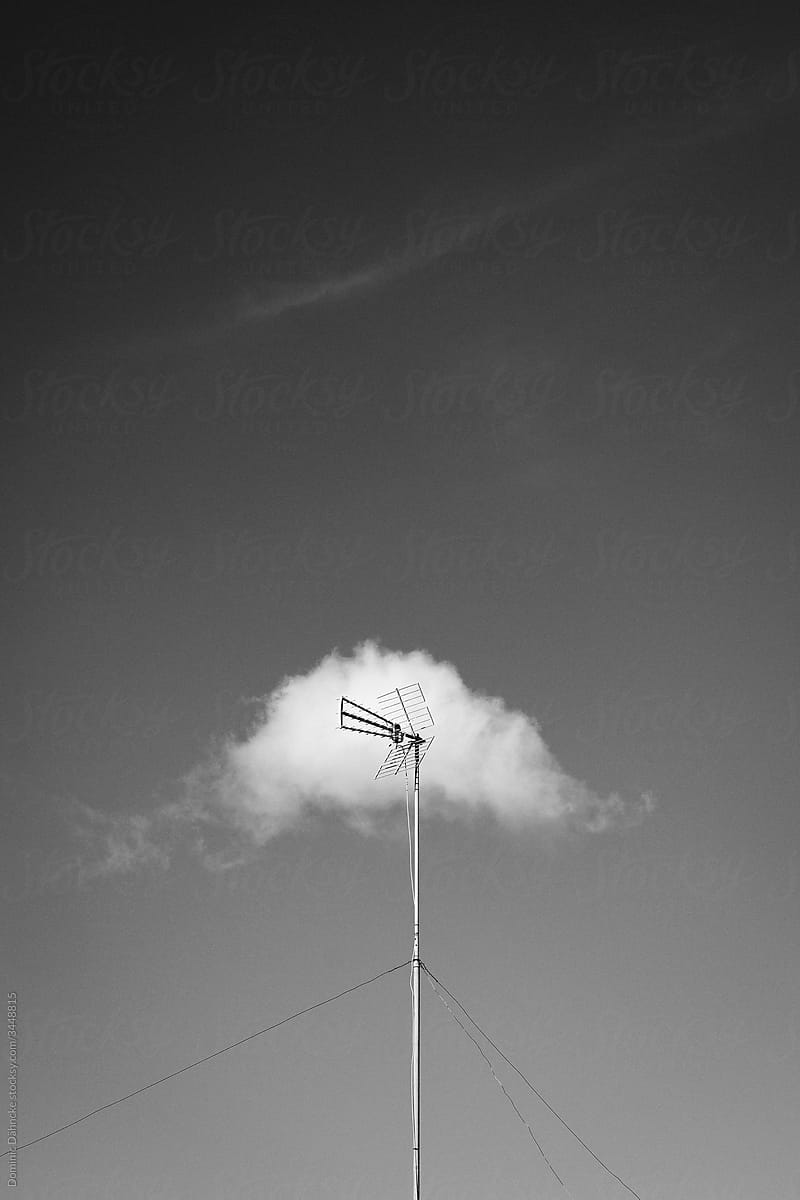 Antenna with a cloud behind.