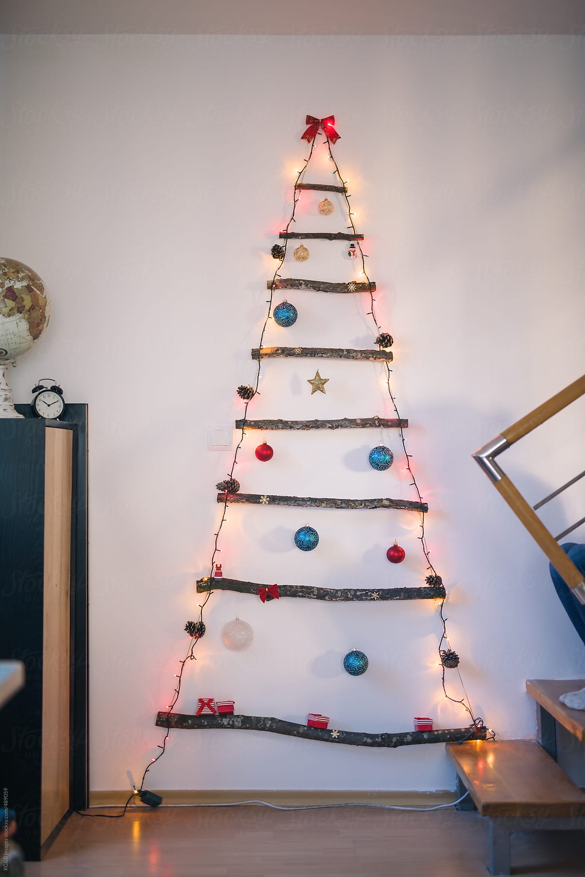 Alternative wooden Christmas tree with glowing lights