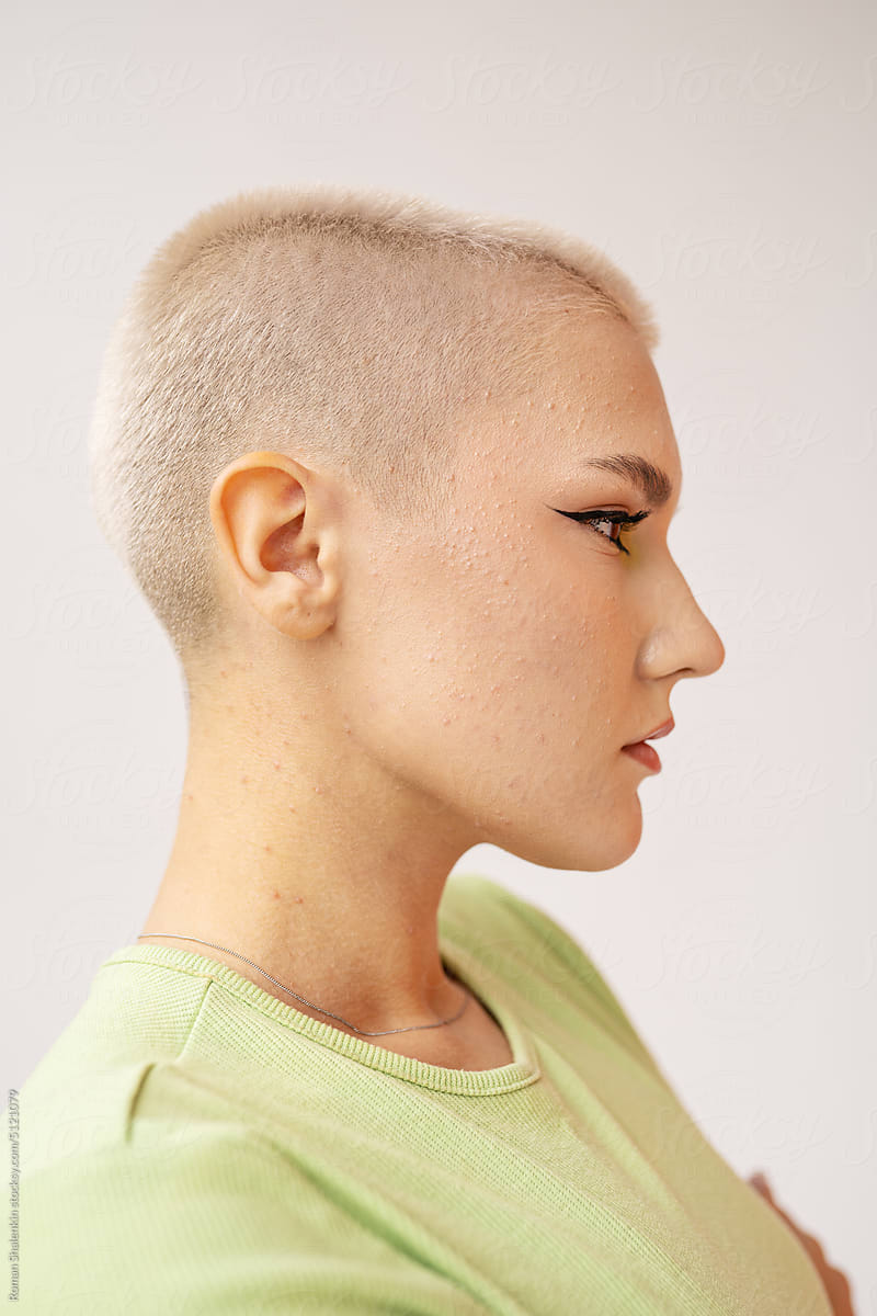 Young Androgynous Model With Short Blond Hair