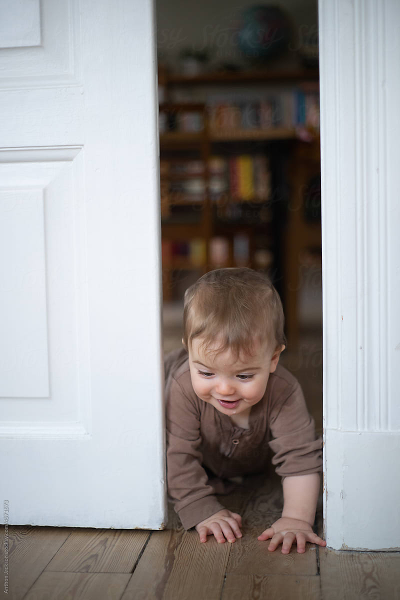 Baby Crawling Through a Doorway