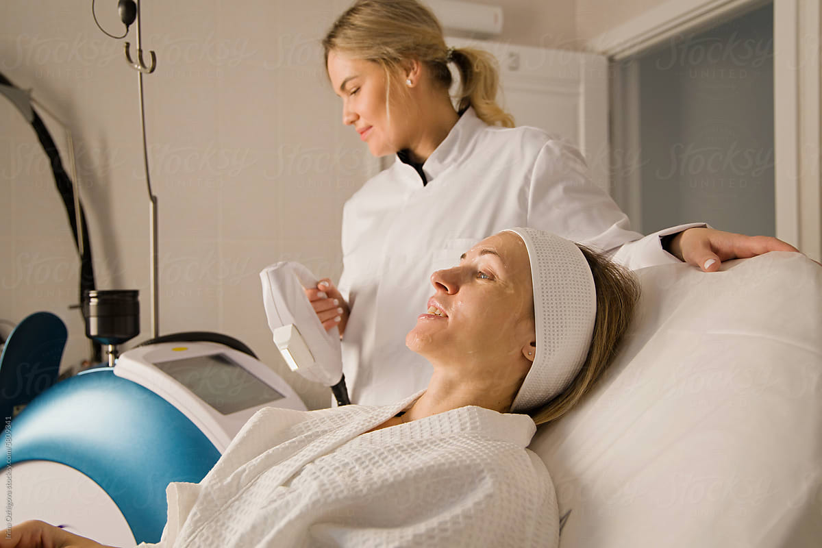 woman getting laser procedure on a face