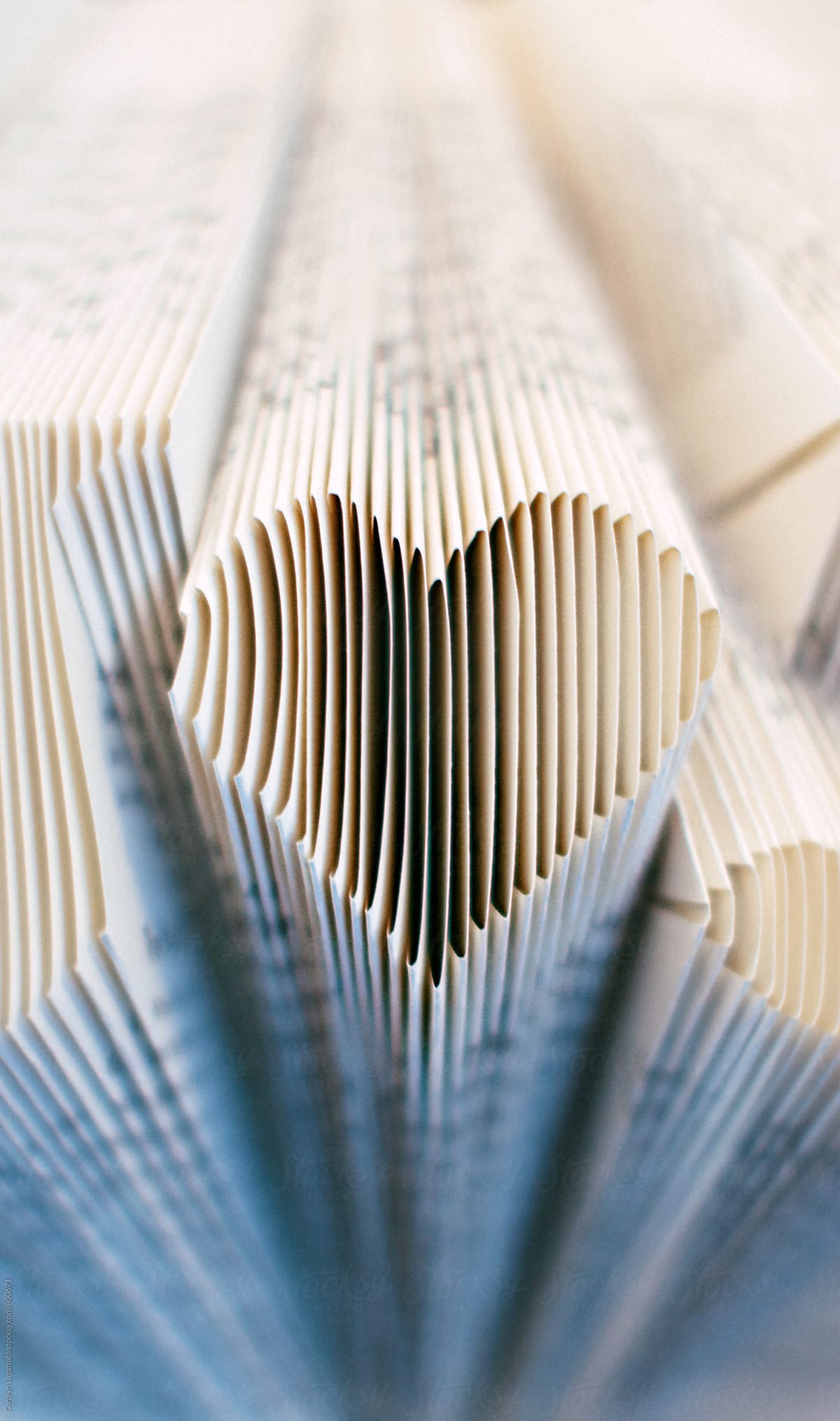 Pages of a book cut into the shape of a heart