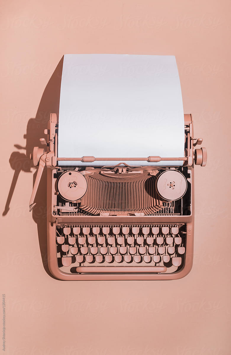 Pink typewriter on pink