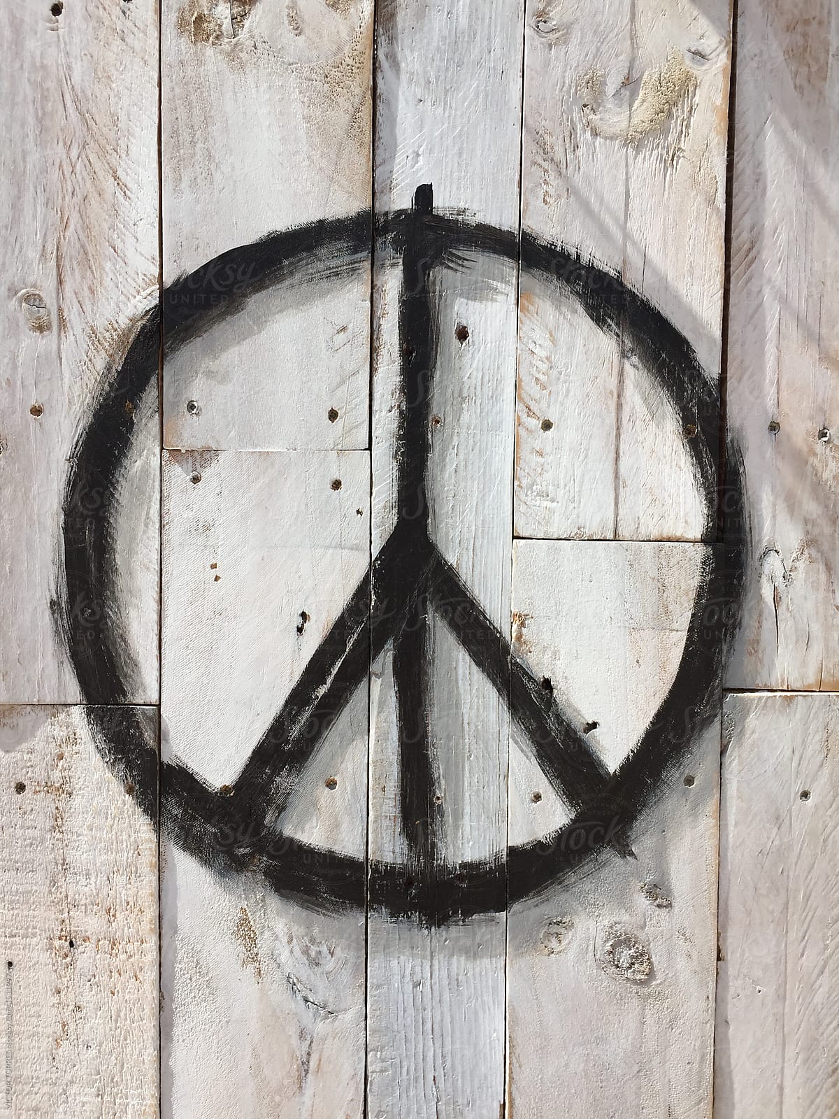 Peace symbol on a wooden board