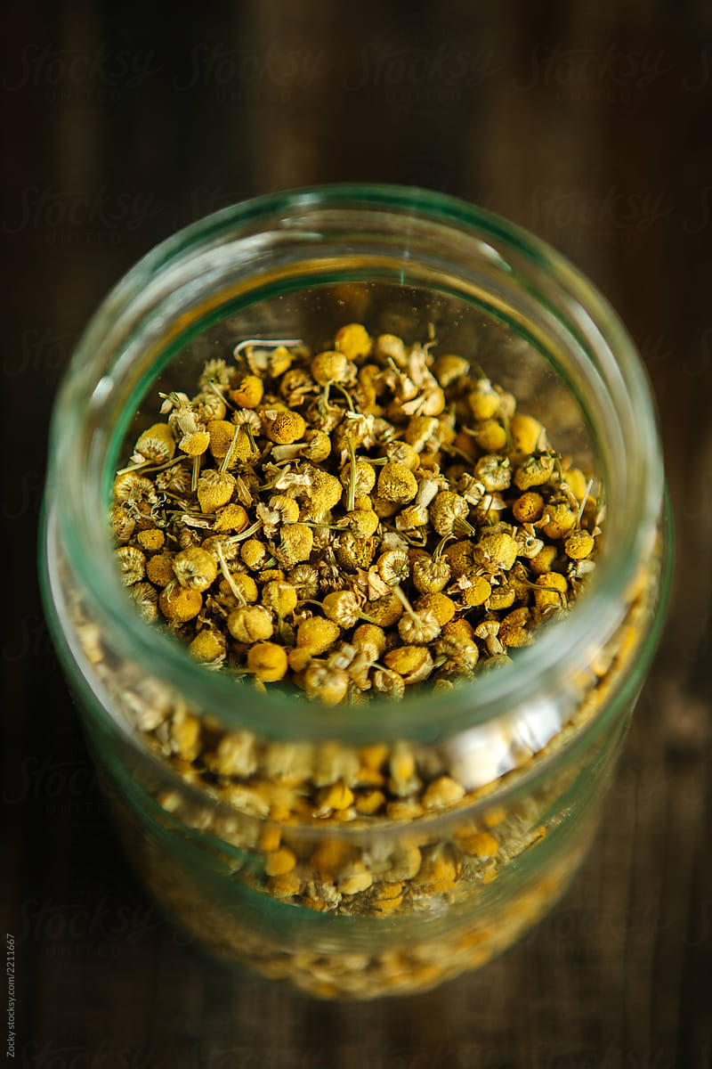 Close Up Of Camomile Flower Tea In A jar