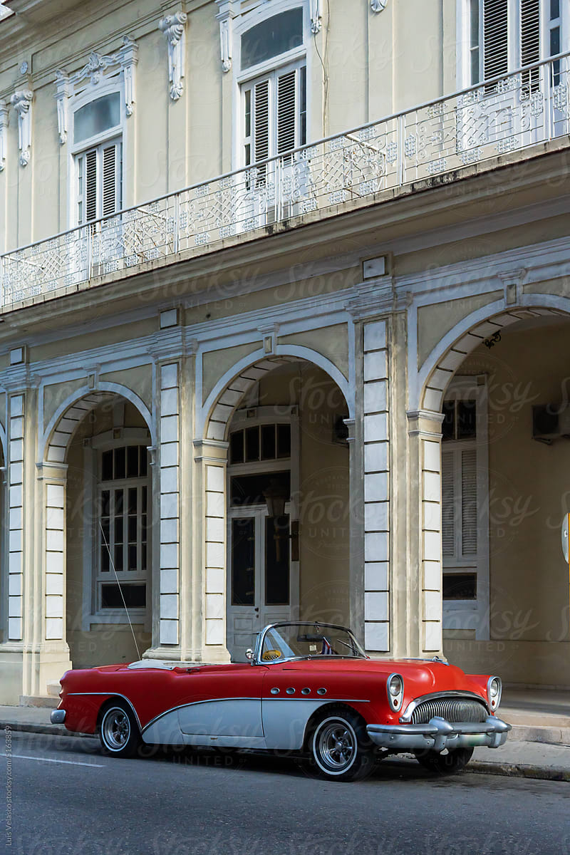 Vintage Red Car Parked In La Havana.