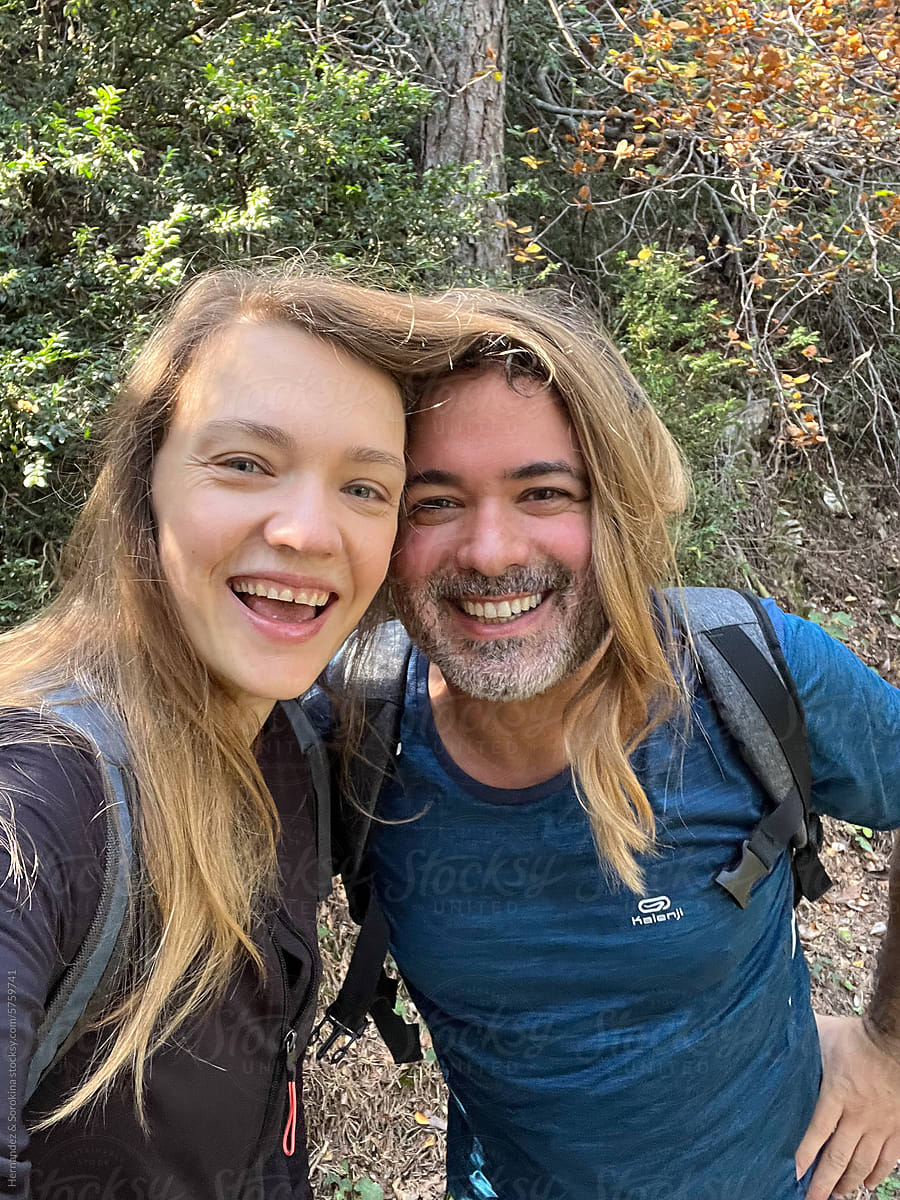 Funny Selfie Of Couple Hiking In The Forest