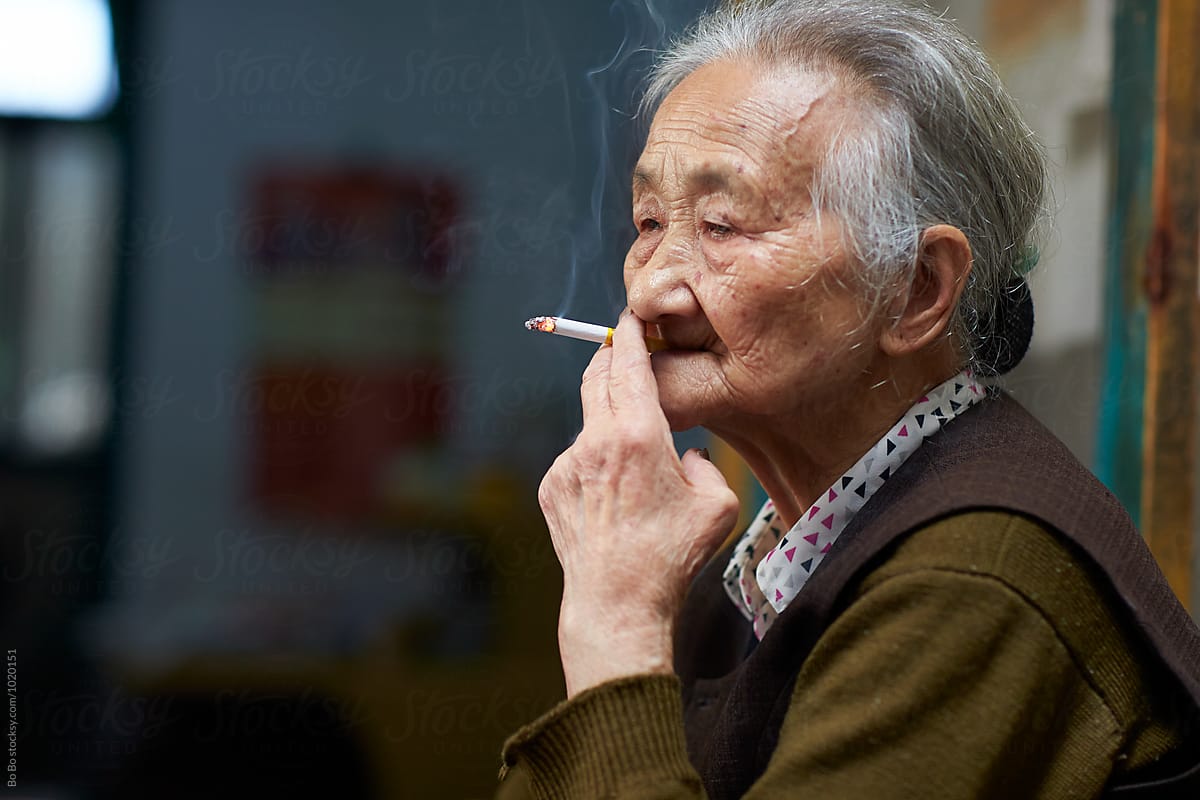 senior woman smoking