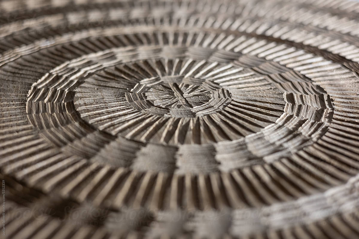 Artisanal Circular Wood Table with Symmetric Texture in Close-up View