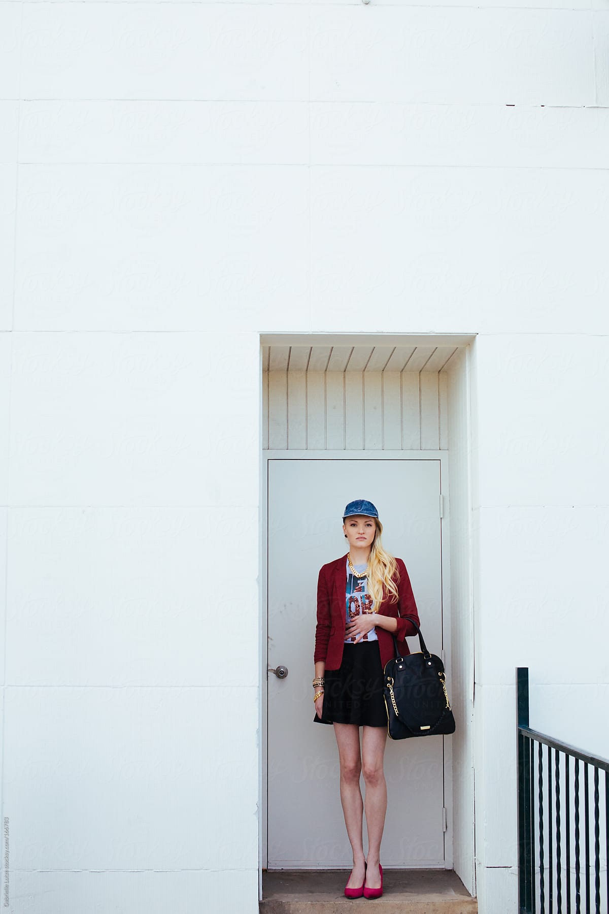 Fashionable City Woman Standing In A Doorway By Stocksy Contributor Gabrielle Lutze Stocksy 5243