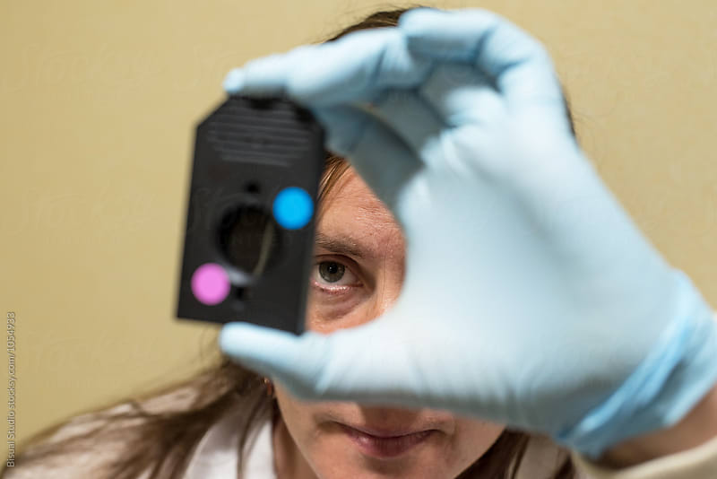 Female scientist on a laboratory of genetic research with a DNA chip
