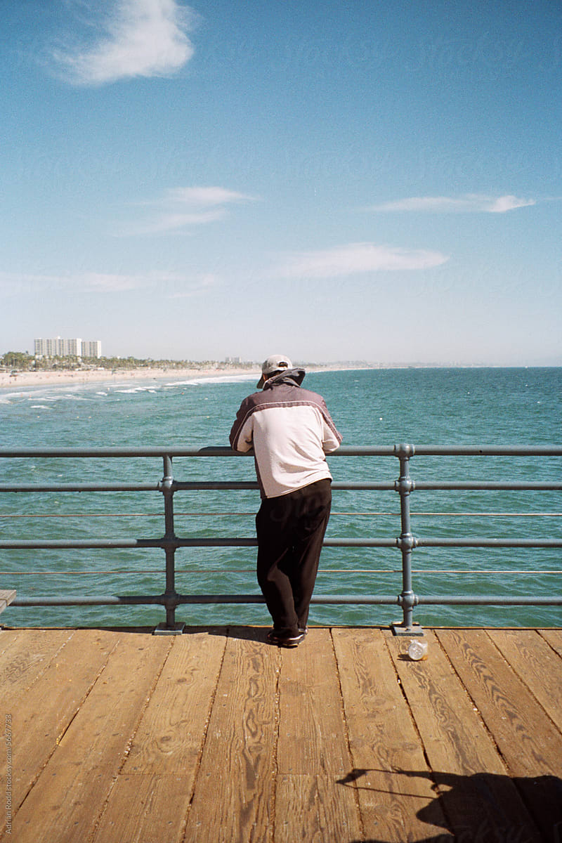 Timeless Serenity: Elderly Gentleman Gazing at the Sea