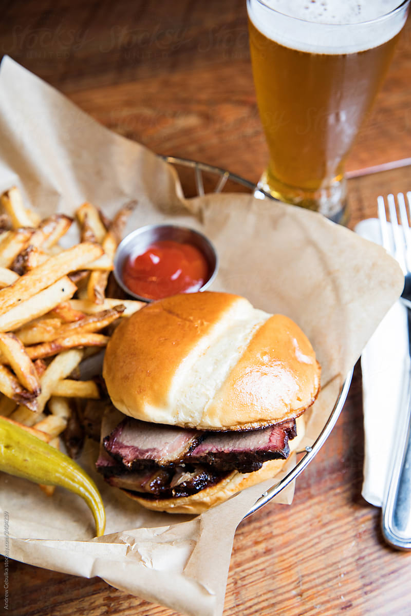Smoked Brisket Sandwich with a Side of Fries
