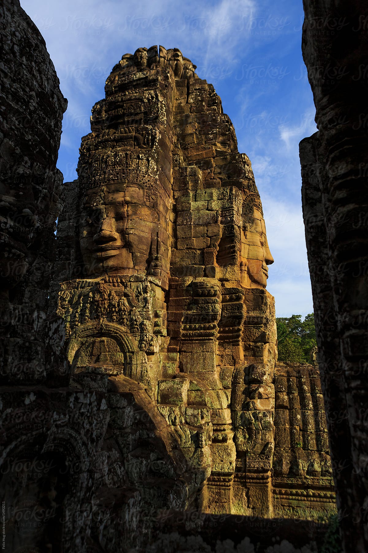 the famous stone faces of the Bayon Temple at Angkor Wat