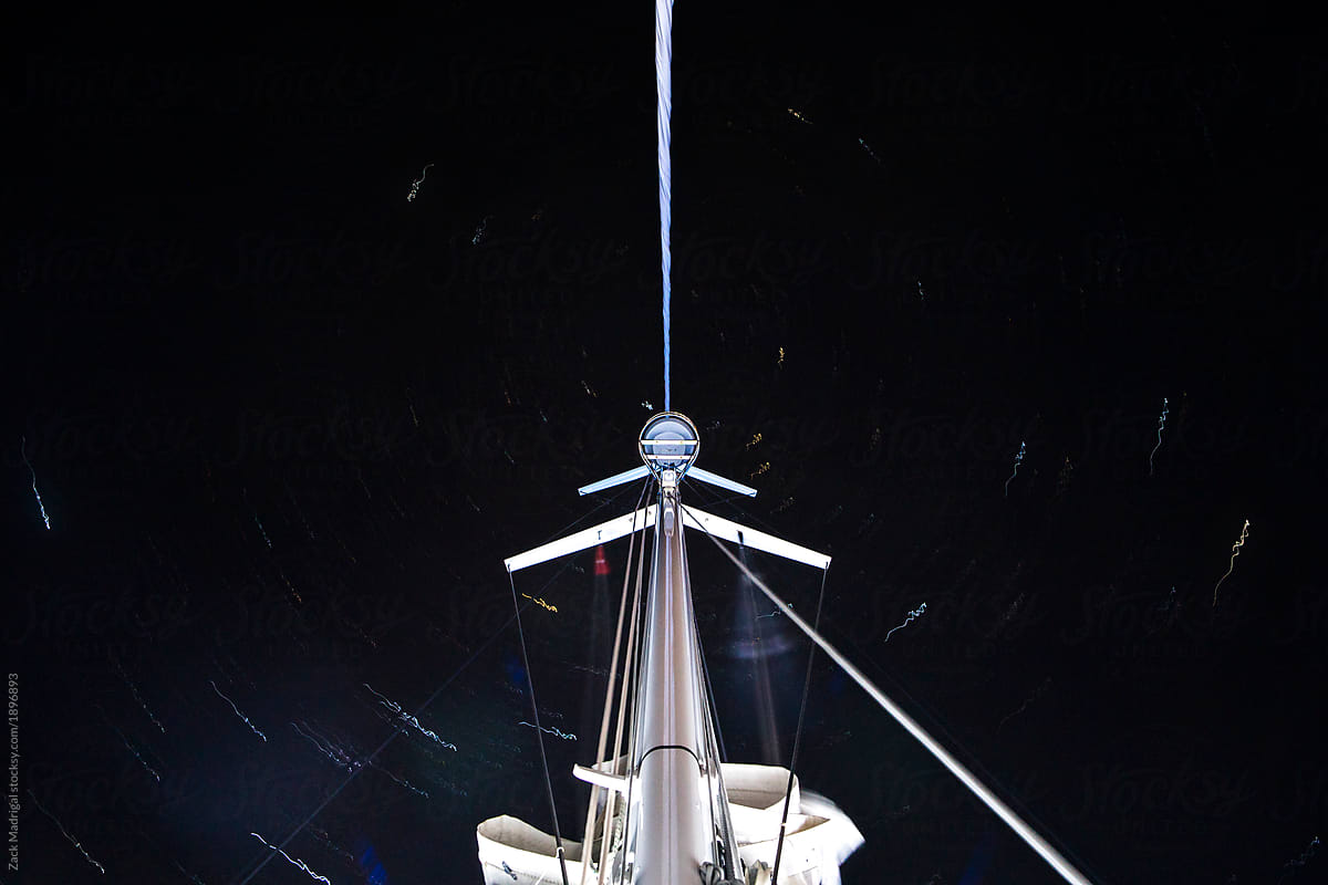 A Boat\'s Mast Against The Night Sky