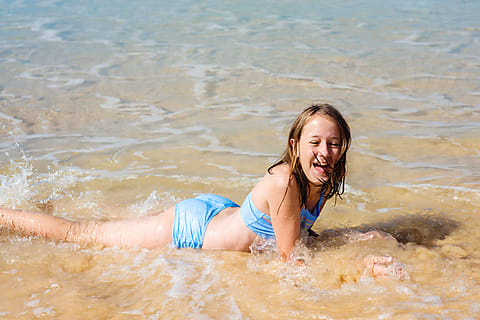 Young Teen In The Ocean by Stocksy Contributor Gillian Vann - Stocksy