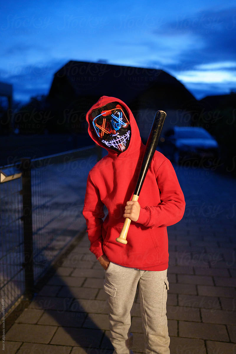 Young boy with a halloween mask