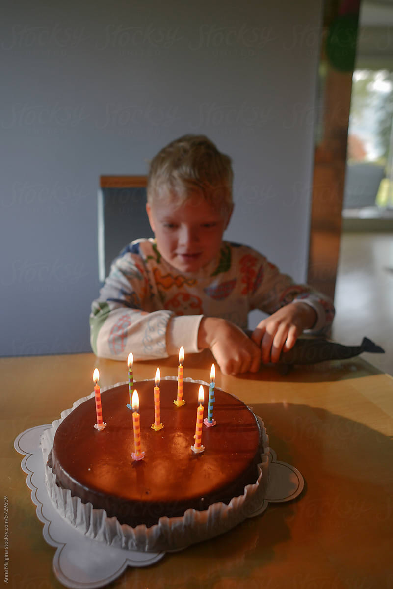Toddlers Birthday Celebration With Cake and Candles