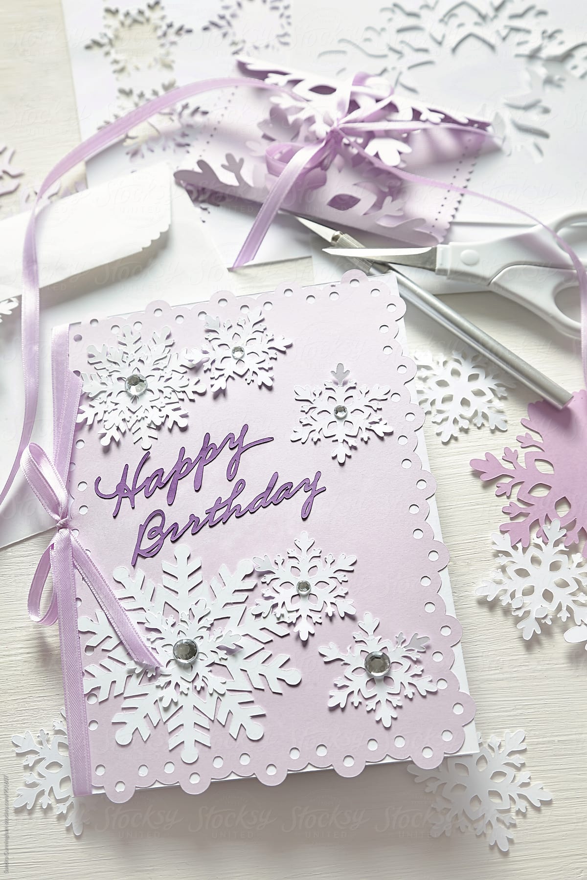 Closeup of a handmade birthday card with snowflakes