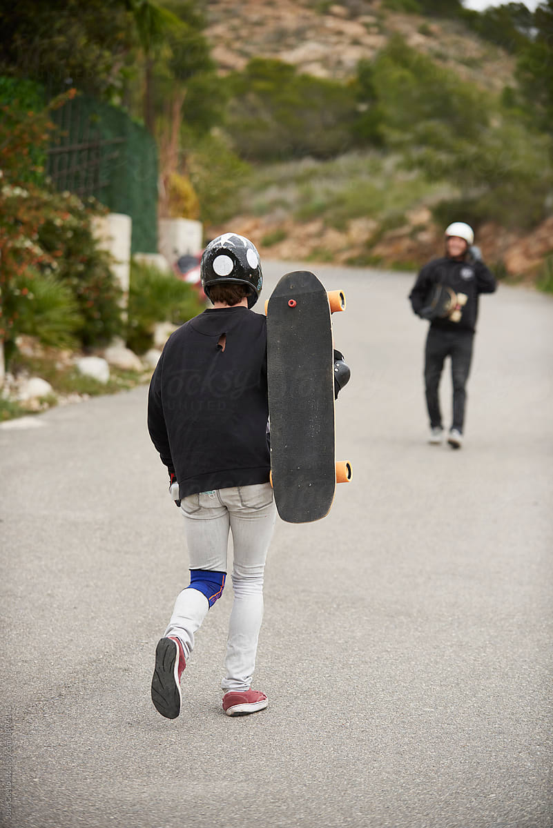 Downhill with longboard in the mountains.