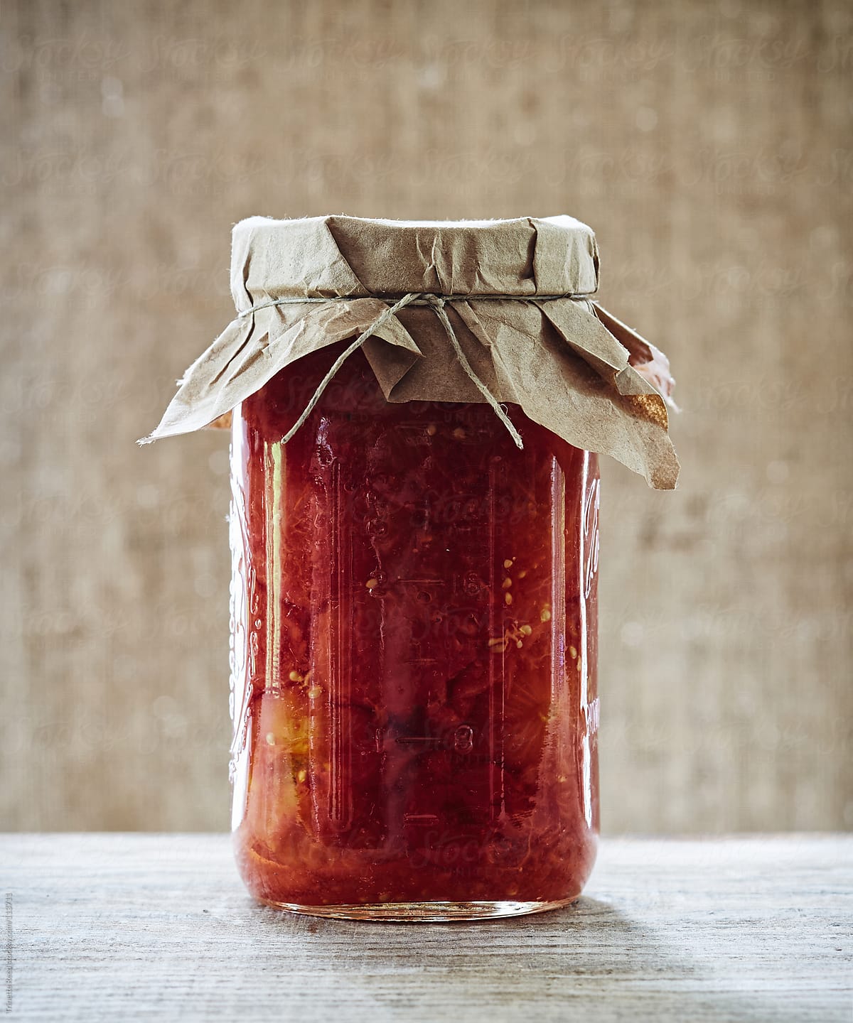 Canned preserved tomato sauce in mason jar