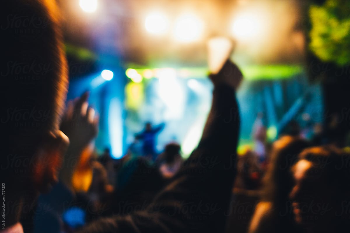 People at a concert at night - defocused