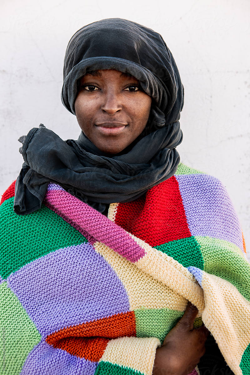 Portrait of an African woman with headscarf.