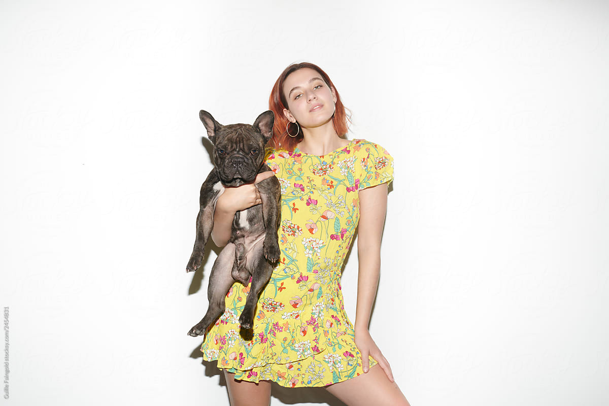 Girl with French bulldog