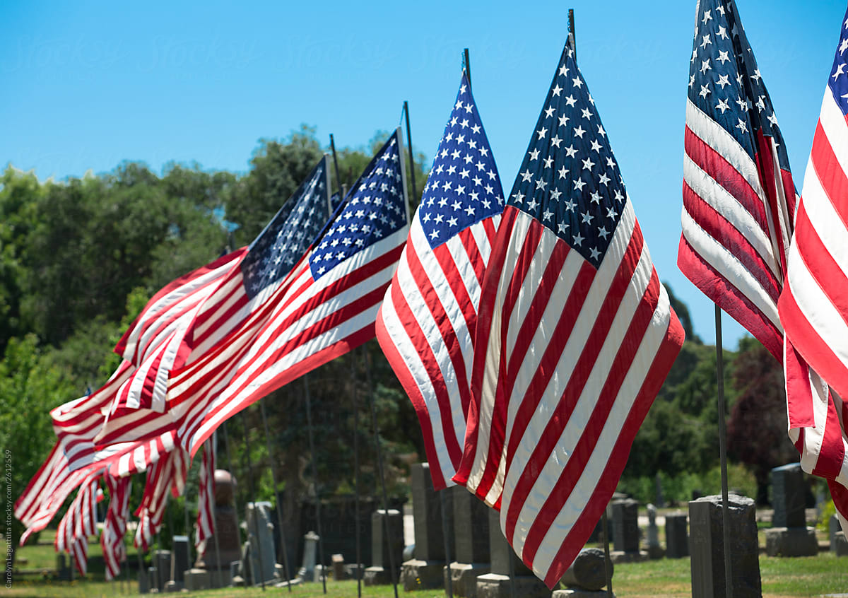 Multiple flags in a cemetery