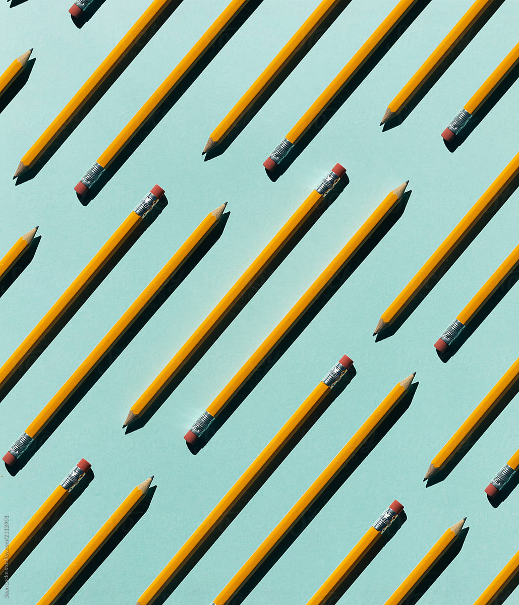 Pattern of Pencils On Blue Paper