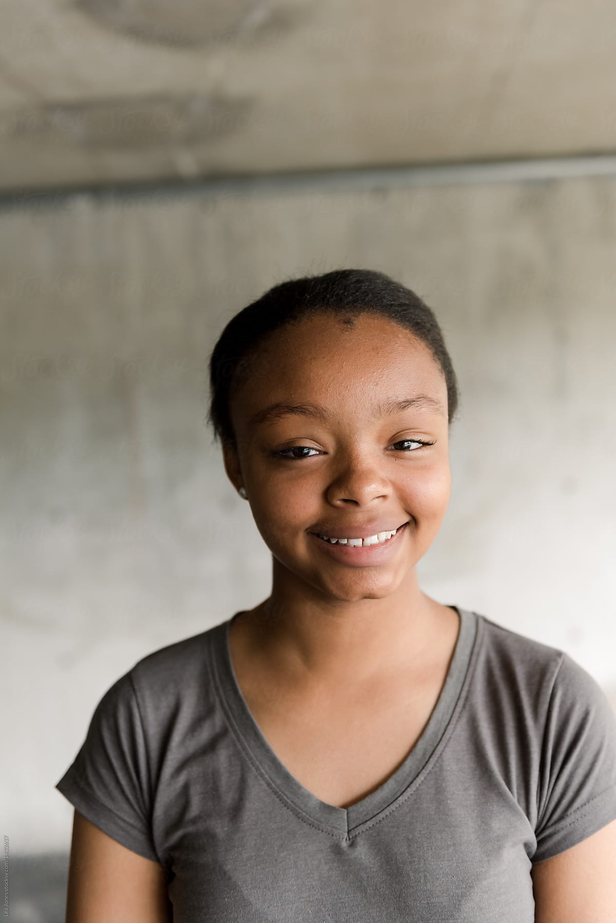 Portrait Of Happy Black Teen Girl by Stocksy Contributor Lea Jones -  Stocksy