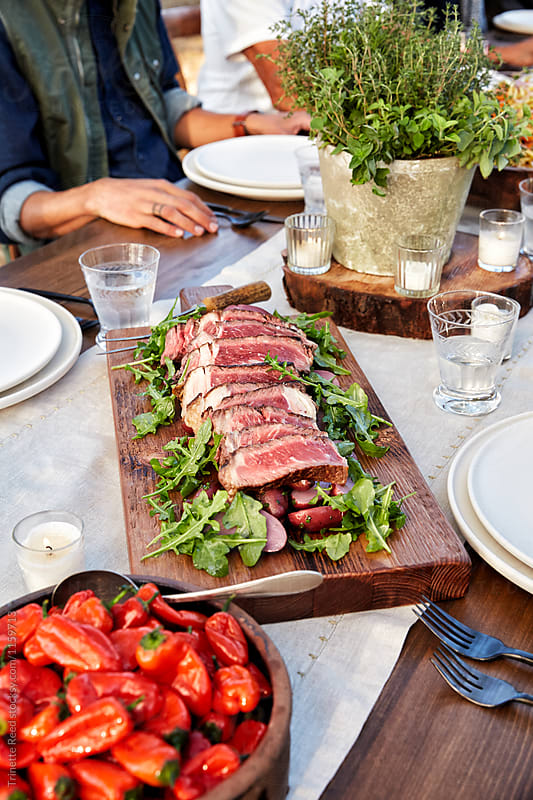 Ribeye steak with arugula at a Farm To Table Dinner Party
