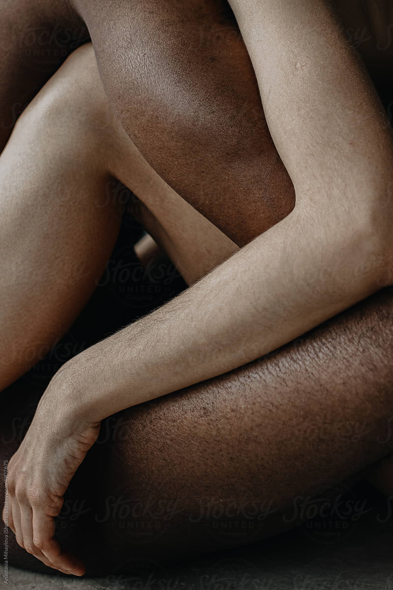 Hands of White Woman And Black Man, Multiethnic Love Couple