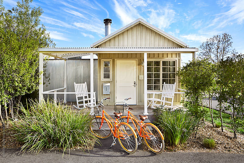 Cruiser bikes in front of cute tiny home cottage