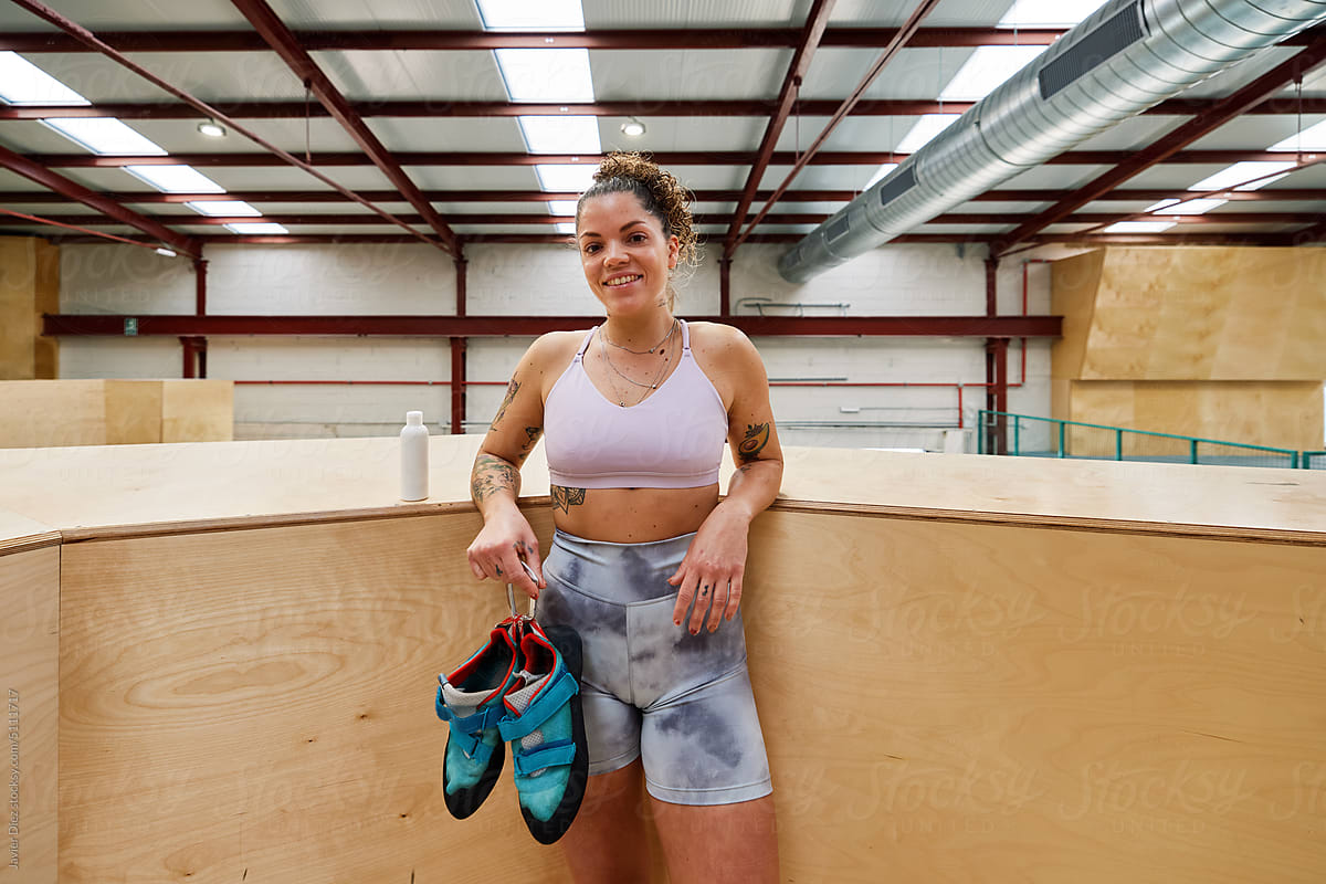 Female climber in bouldering gym