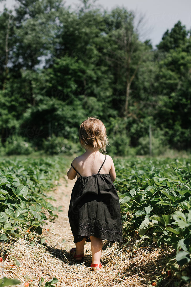 Toddler walking in Strawberry Field