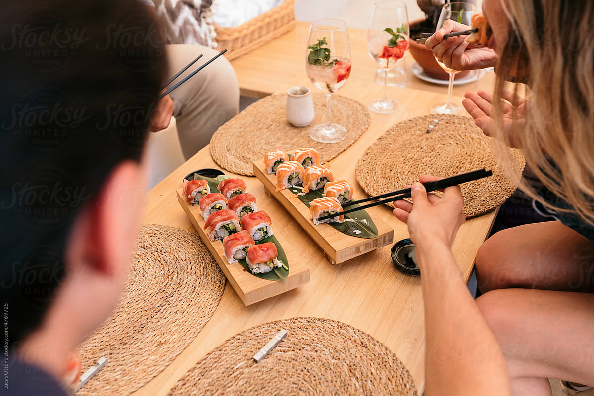 People eating sushi