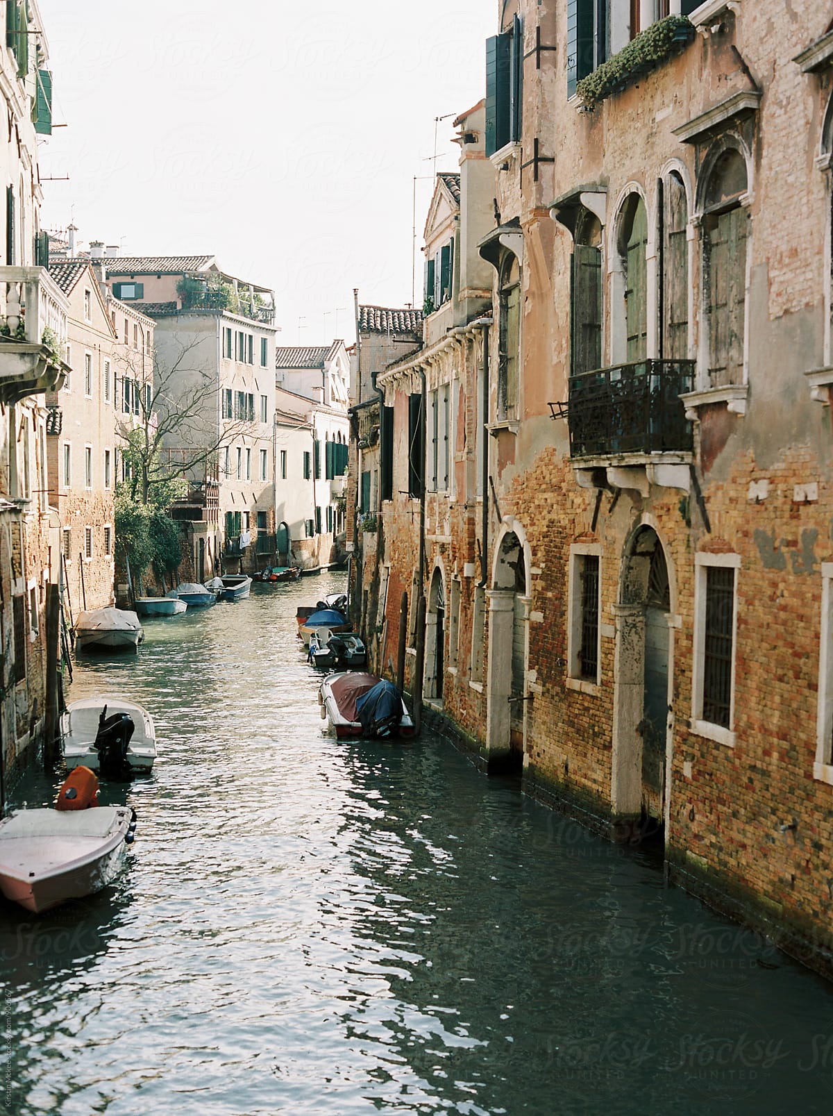 Looking down a canal from a bridge in Venice