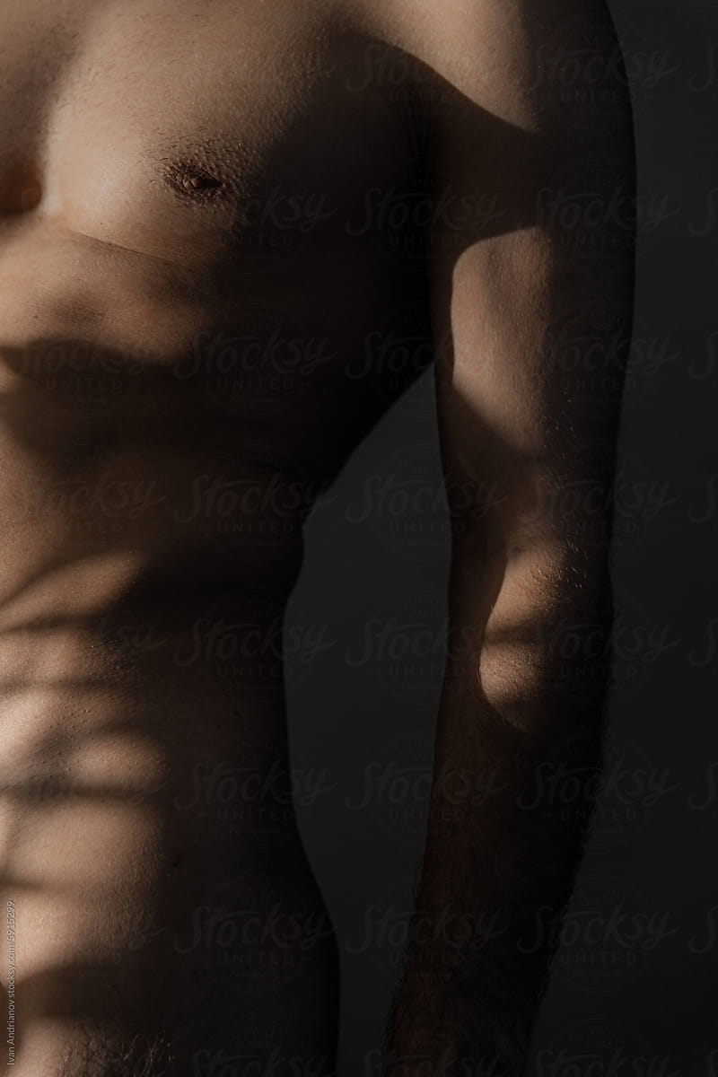 Naked Body Side In Abstract Light And Shadows
