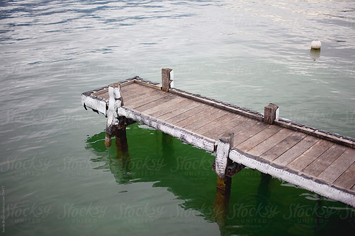 A Small Wooden Pier Or Wharf In A Lake by Stocksy Contributor
