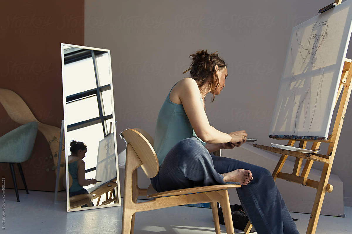Female artist working  in studio